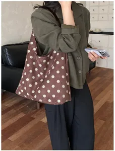 Brown suede polka dot shoulder bag, retro large capacity tote bag showing detail view.