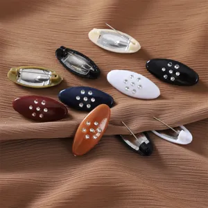 Colorful oval anti-exposure brooch rhinestone plastic scarf pin detail view showcase
