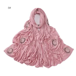 Detailed view of pink elastic rhinestone swirling fireworks long scarf, breathable solid color shawl.
