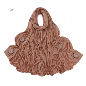 Detailed close-up view of the elegant rhinestone swirl stretch jersey hijab scarf for women.