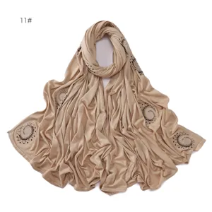 Detailed view of elastic stretch cotton hijab scarf featuring sparkling rhinestone spiral patterns.