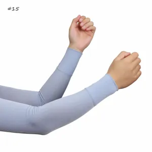 Detail shot of solid color ribbed ice silk sun protection arm sleeves showing fine texture.