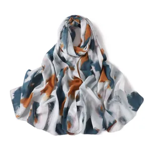 Élégant foulard en mousseline imprimé abstrait, long hijab léger et respirant pour femmes.