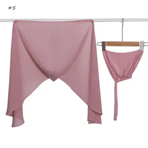 Detail view of the pink chiffon hijab set with matching tie cap, elegant and lightweight.