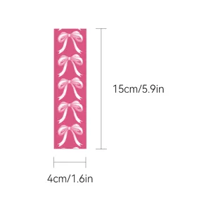 Pink bow bookmark size detail view, 15x4 cm reading marker for students and book lovers.