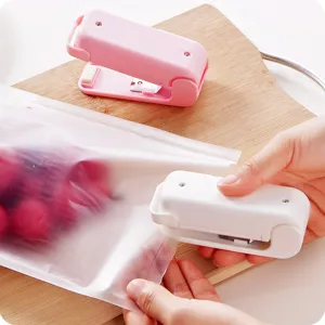 Mini sigillatrice portatile per sacchetti alimentari, termosigillatrice per buste di plastica.