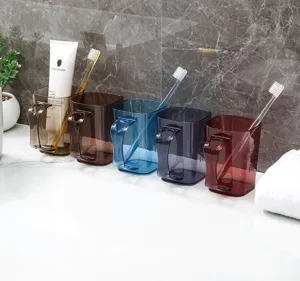 Transparent plastic mouthwash cups with handle, simple bathroom toothbrush holder set.