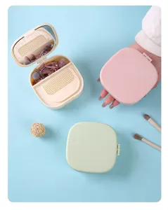 Portable folding makeup mirror jewelry storage box with built-in comb and cute design