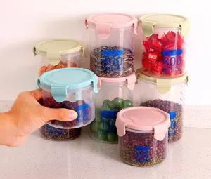 Transparent plastic food storage jar with sealing lid for kitchen cereal and grain organization.