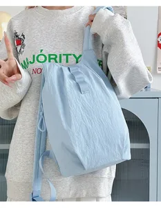 Sac à dos gilet bleu léger pour voyage quotidien, sac de jour décontracté unisexe.