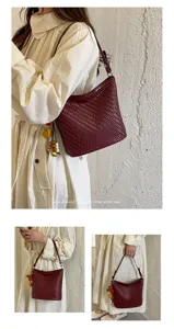 Stylish retro woven bucket bag for women, versatile PU leather shoulder and crossbody bag.