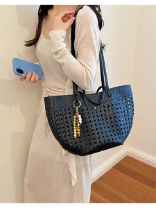 Black woven leather tote bag for women, retro style large capacity shoulder bag for commute.