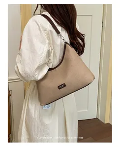 Minimalist retro hobo shoulder bag for women, large capacity casual chic underarm bag.