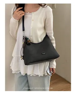 Classic black underarm bag for women, large capacity retro shoulder bag, stylish casual handbag.