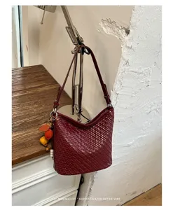 Detailed view of the retro woven shoulder bag showcasing exquisite craftsmanship and rich texture.