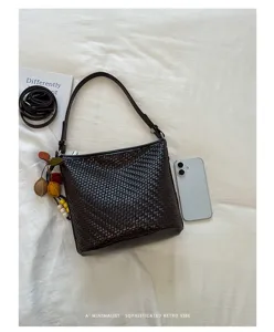 Simple vintage woven leather shoulder bucket bag for women, stylish daily commuter crossbody bag.