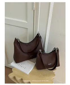 Brown retro underarm shoulder bag set, minimalist design, elegant daily casual handbag.