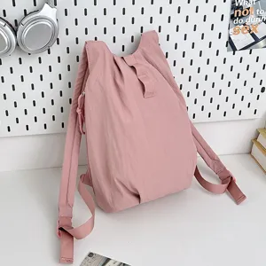 Sac à dos rose minimaliste, sac de jour décontracté unisexe léger pour voyage été.