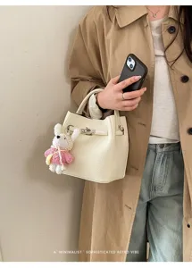 Korean style litchi pattern commuter bucket bag for women, stylish minimalist handbag.