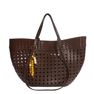 Brown leather cutout tote bag for women, retro fashion large capacity shoulder bag for daily work.
