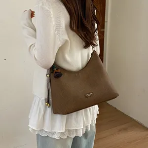 Vintage brown hobo shoulder bag for women, large capacity retro casual underarm bag.