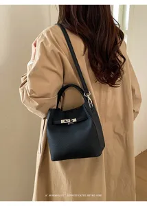 Korean style pebbled leather bucket bag with metal lock, chic shoulder handbag for women.