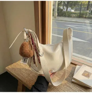 Retro crescent hobo shoulder bag for women, trendy Korean style casual large capacity tote.