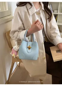 Borsa a secchiello azzurro chic da donna, elegante borsa a mano minimalista per tutti i giorni.
