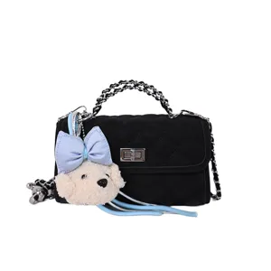 Black quilted chain shoulder bag with cute puppy plush charm for women daily fashion style