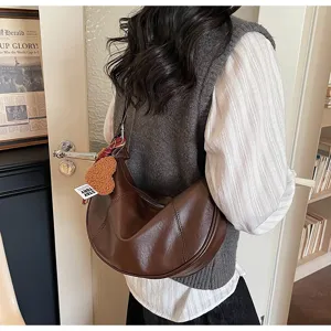 Vintage brown hobo shoulder bag for women, stylish PU leather casual large capacity tote.
