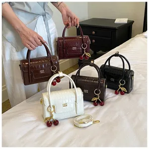 Elegant crocodile pattern handbag for women stylish top handle bag with cute cherry charm