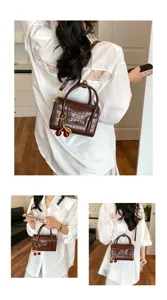 Brown crocodile pattern crossbody bag for women with cute cherry charm stylish handbag.
