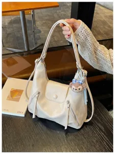 Borsa a tracolla in pelle PU beige con ciondolo in peluche, elegante borsa da donna.