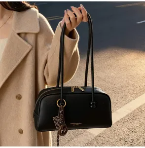 Retro black bowling bag for women, stylish leather pillow handbag, casual commuter shoulder bag