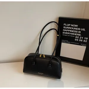 Black vintage bowling shoulder bag for women, casual PU leather handbag underarm daily style.