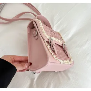 Pink plaid backpack with cute bow, lace trim and side profile detail for sweet daily fashion.