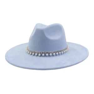 Exquisite light blue suede fedora hat detail featuring sparkling rhinestone pearl band trim.
