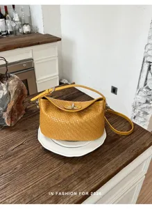 Gele geweven lederen schoudertas chique dumpling tas modieuze dames handtas voor u