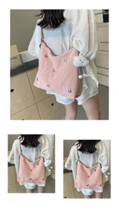 Stylish pink butterfly tote bag for women, versatile large capacity shoulder bag for daily commute.