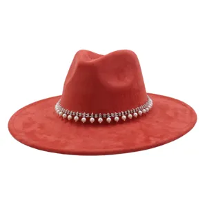 Red suede fedora hat detail, elegant pearl and rhinestone trim for autumn winter fashion.