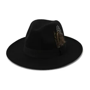 Close-up detail of the black wool fedora hat, featuring chic feather decor and wide flat brim.