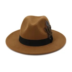Detailed shot of the brown wool fedora hat, highlighting the black band and feather accent.