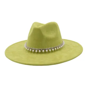 Green suede fedora hat detailed with pearl and rhinestone band for winter fashion styles