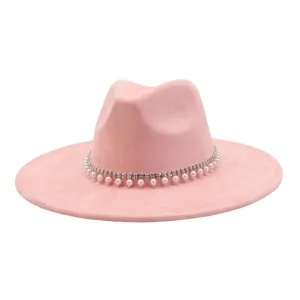Pink suede fedora hat detail, showing the exquisite pearl and rhinestone trim band.