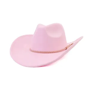 Close-up detail of the pink faux suede western cowboy hat with braided decorative band texture.
