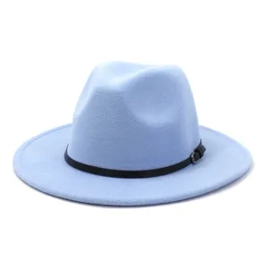Close-up detail shot of light blue woolen fedora hat featuring a black leather belt.