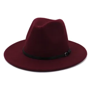 Burgundy wool felt fedora hat detail closeup showcasing black leather belt and metal buckle.