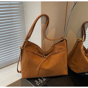 Vintage brown women shoulder bag commuter tote detail view, stylish PU leather purse.