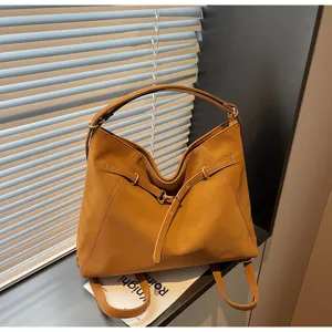 Stylish brown leather women backpack, versatile multi-purpose shoulder bag for commute.