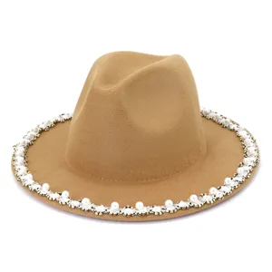 Detail view of elegant camel wool fedora hat featuring sparkling crystal and pearl brim trim.